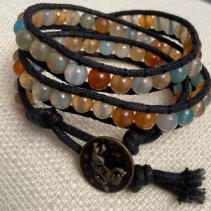Boho Wrap bracelet, hand-sewn, glass beads on black leather cords.